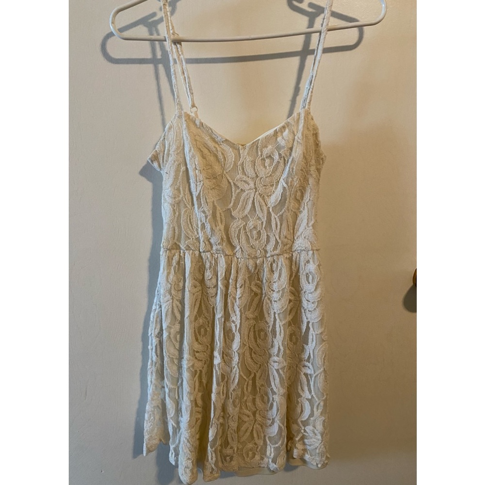 Off white cream color with lace throughout dress